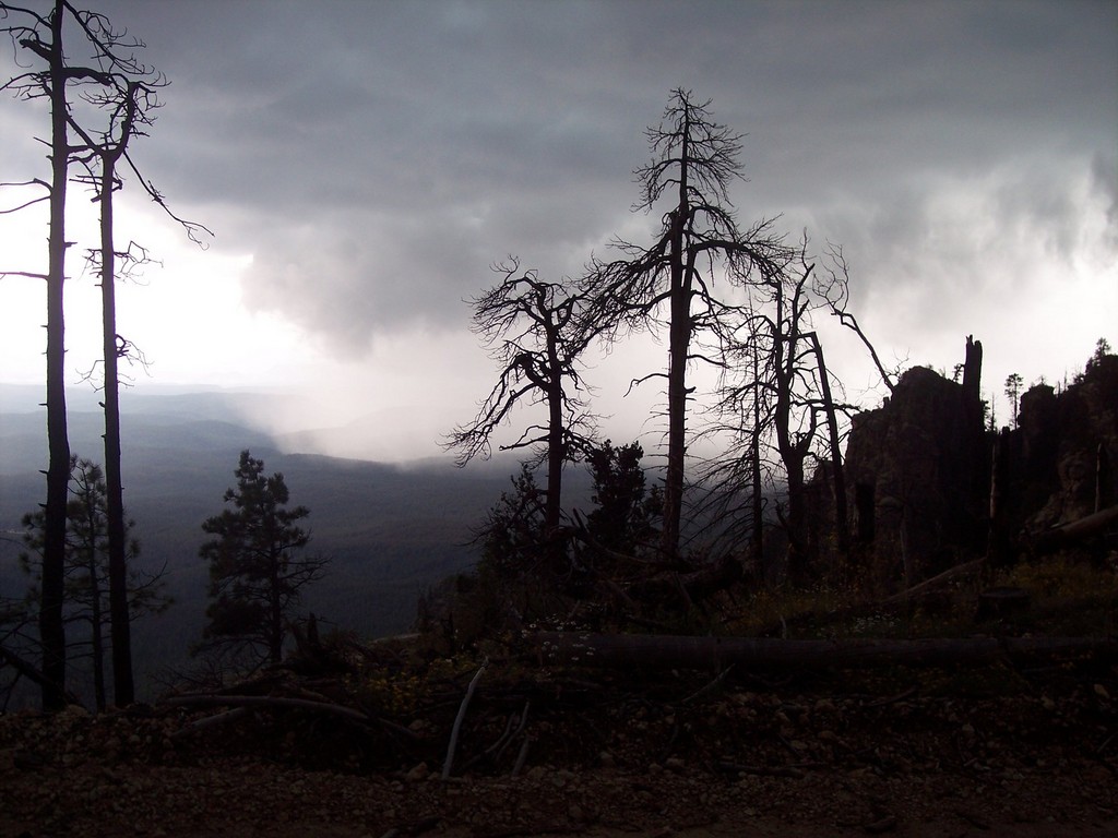 rain clouds coming in over the rim